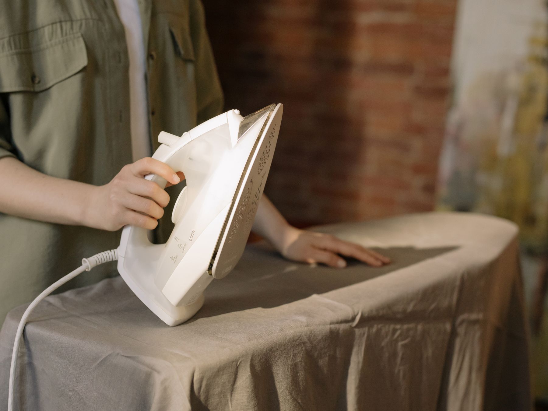 A garment being professionally pressed