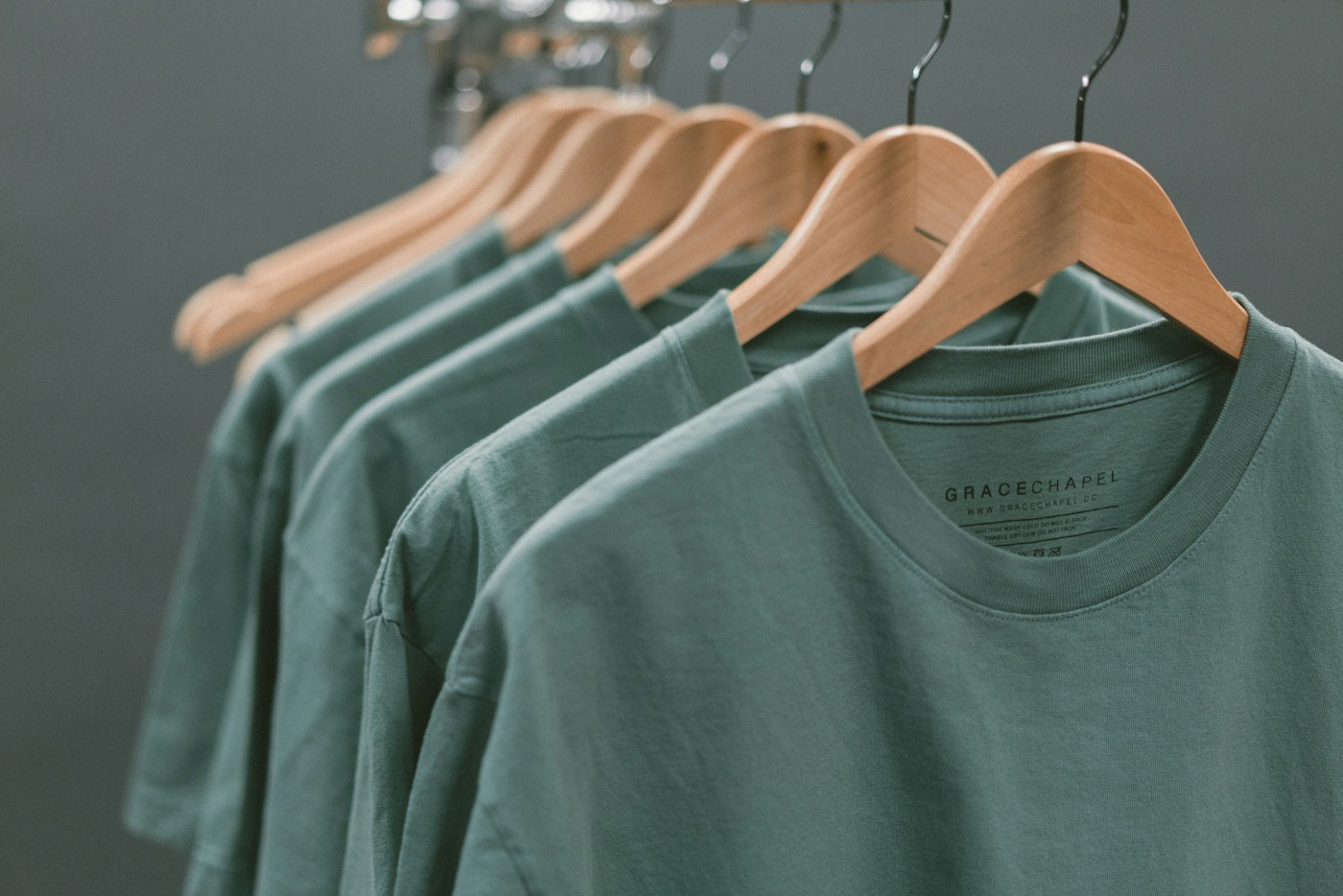 Finished garments hanging neatly on a clothing rack