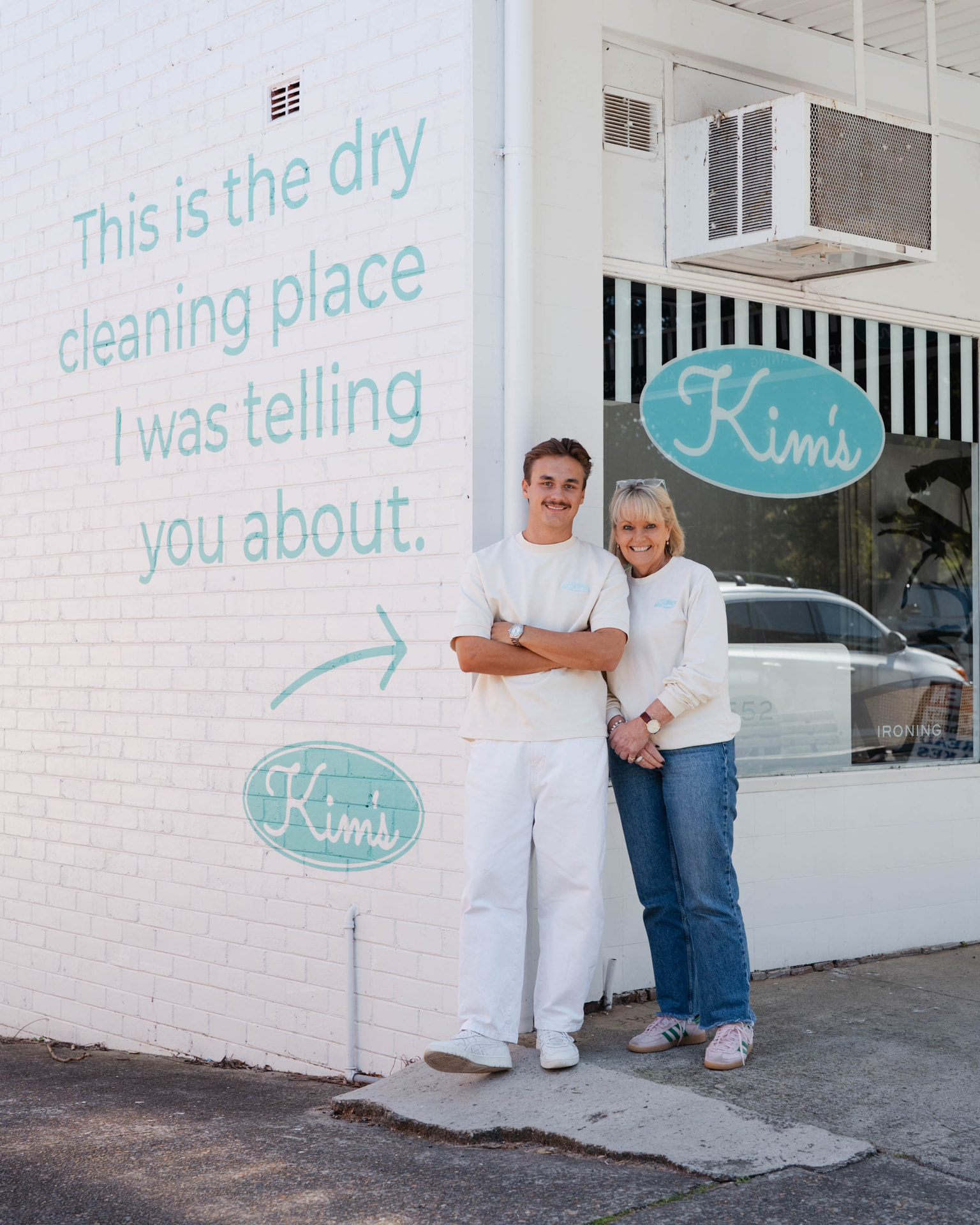 Kim and a team member outside the Kim’s Dry Cleaning store in Caringbah South